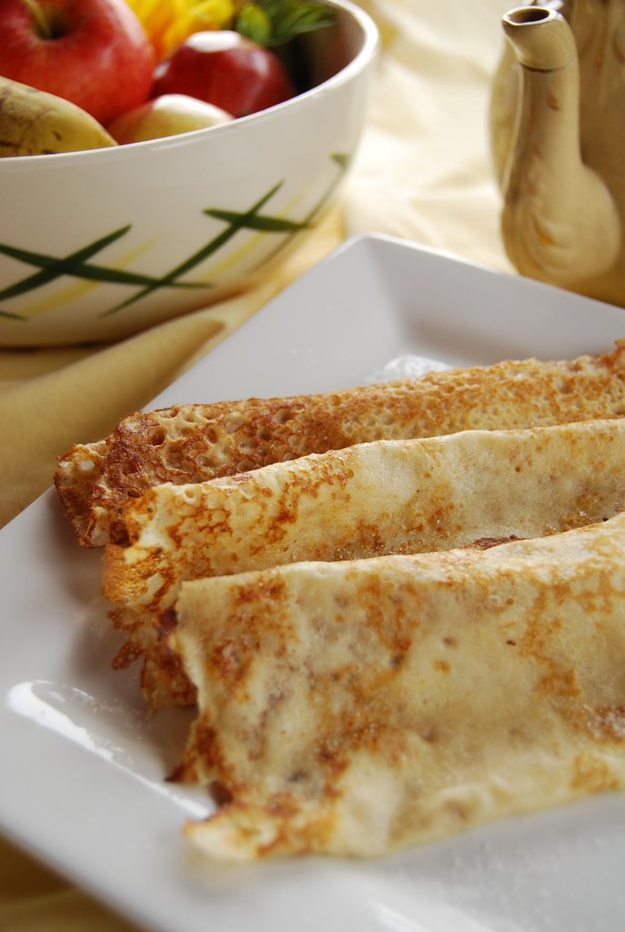 Thin British pancakes sprinkled with lemon juice and sugar