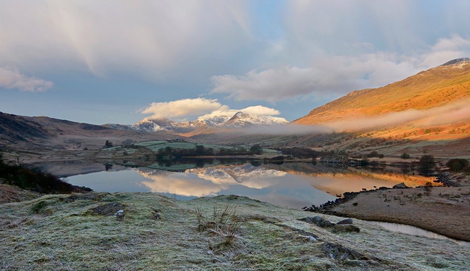 Reflection of the (Yr Wyddfa) Snowdon horseshoe off the lake (Llynau Mymbyr), March 2024