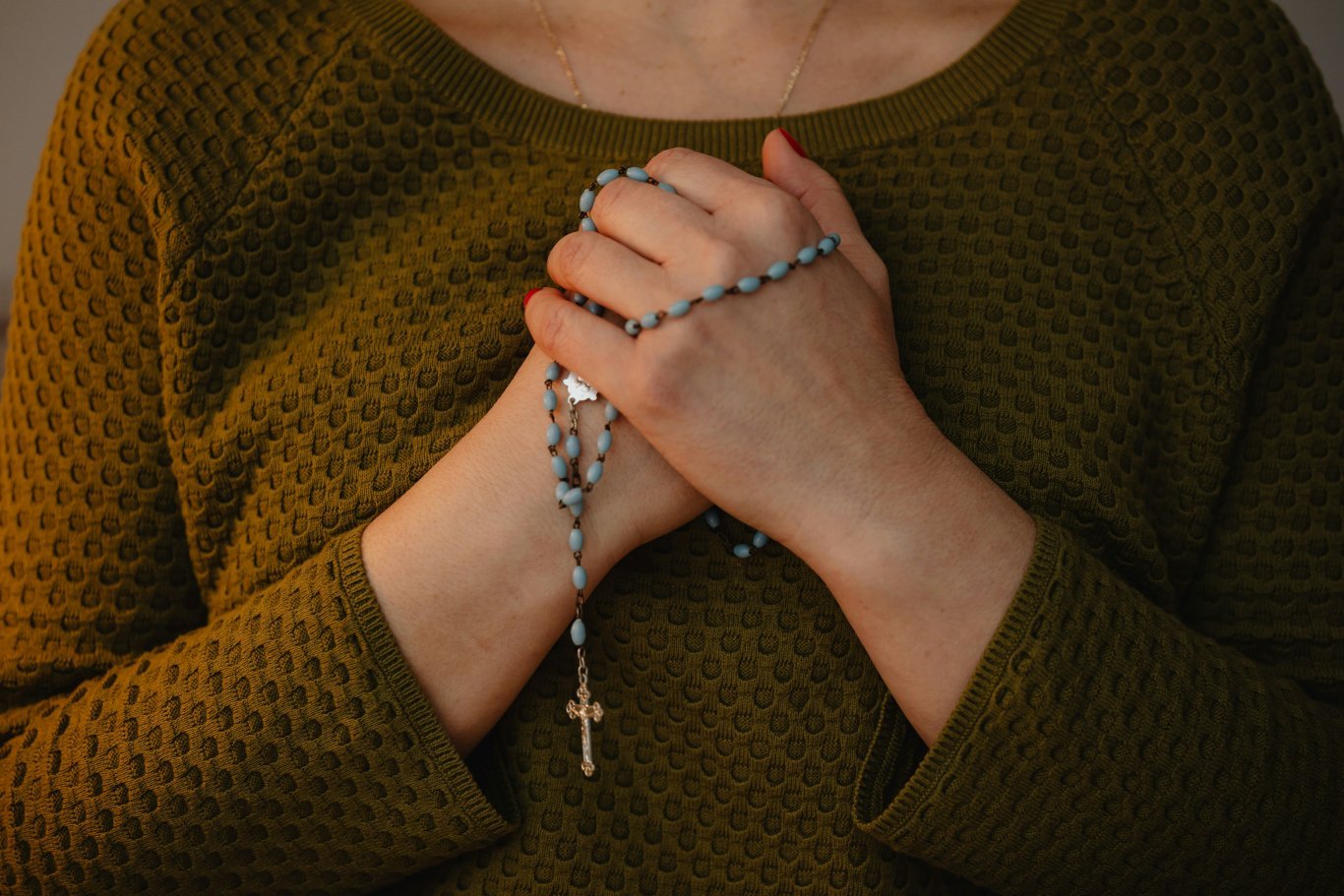 Holding the Cross