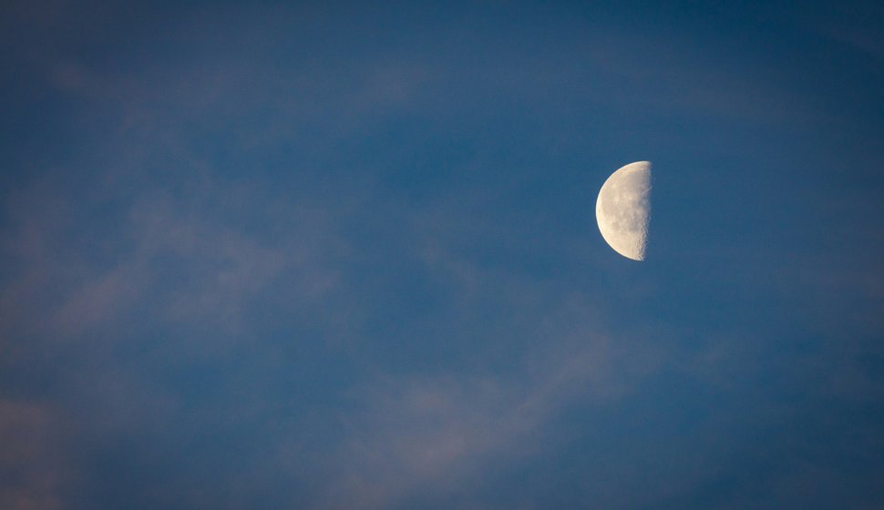 Full moon in a blue sky